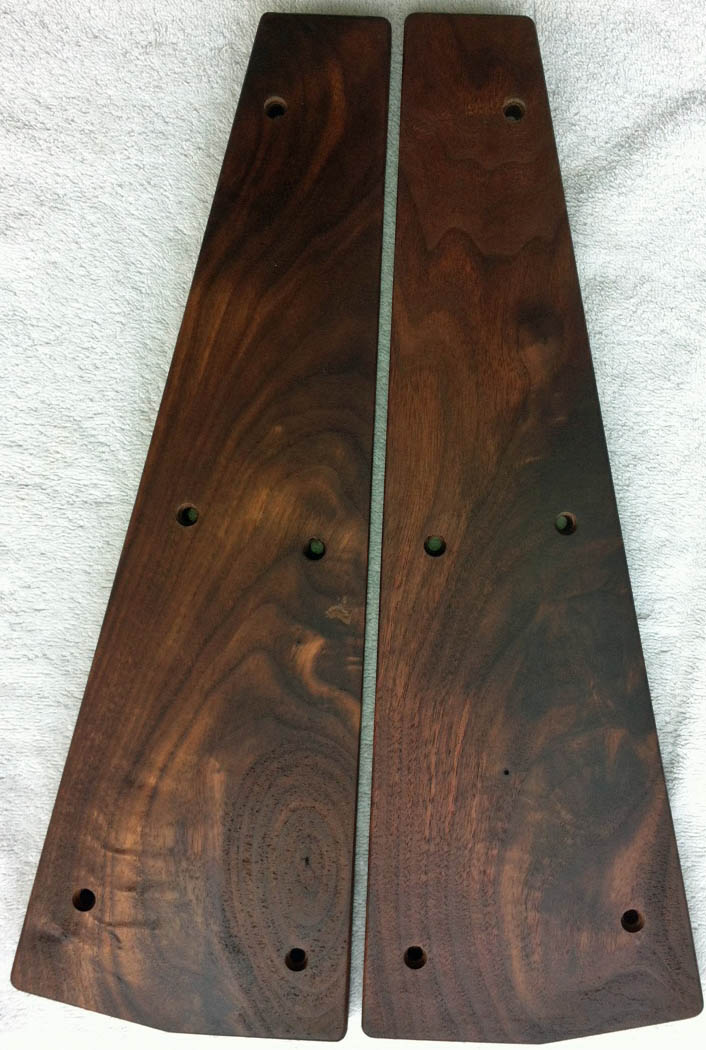 Ornate walnut end pieces.jpg